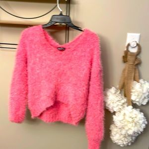 Stunning and sexy pink fuzzy sweater . Worn once .